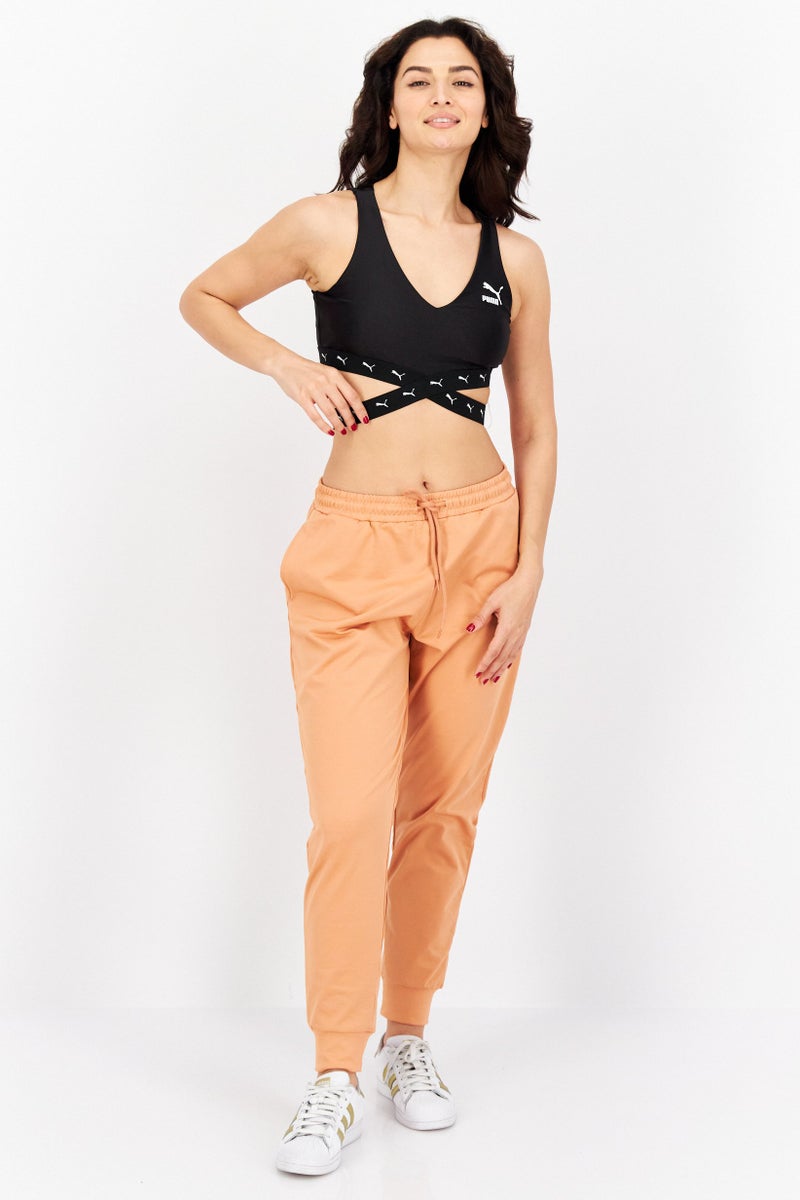 PUMA توب تدريب قصير بلا أكمام ضيق للنساء، أسود - Image 4